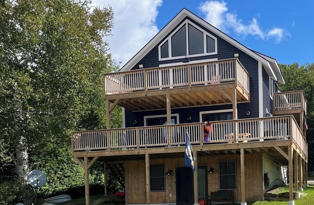 Experience Lakeside Living with a Perfect Blend of Rustic Charm & Modern Luxury