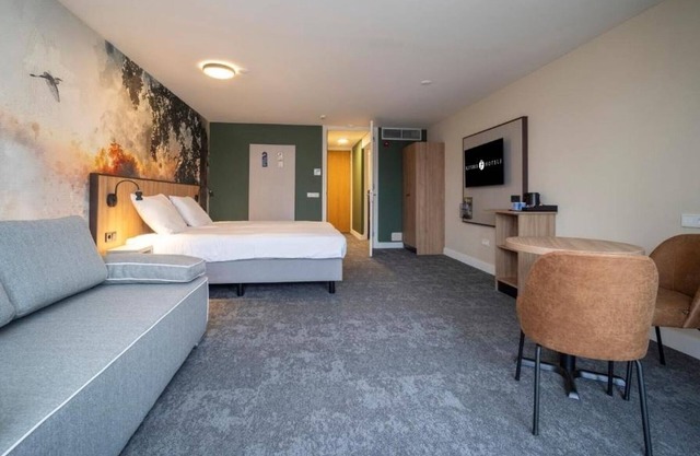 Explore Groningen from a Scenic Room w/Balcony Near Speelgoedmuseum Roden
