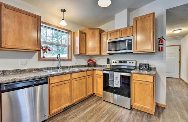 Family-Friendly Getaway with Tainter Lake Access!