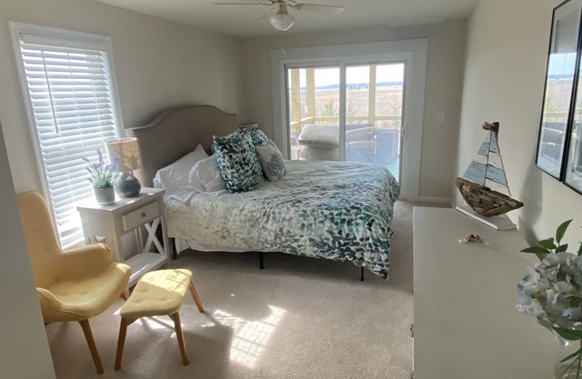 Family Friendly Modern Cottage with Large Deck Steps From Beach