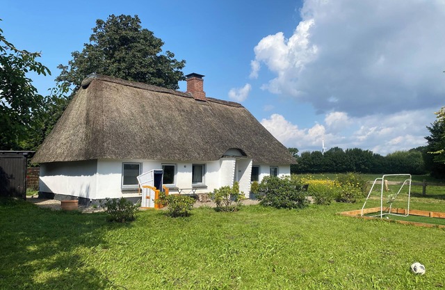 Family vacation in a thatched cottage