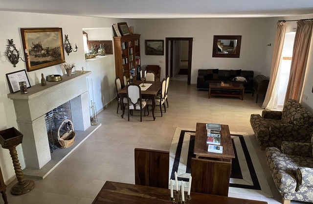 Farm of 3 has fenced, with two-story house and stables with dressage track