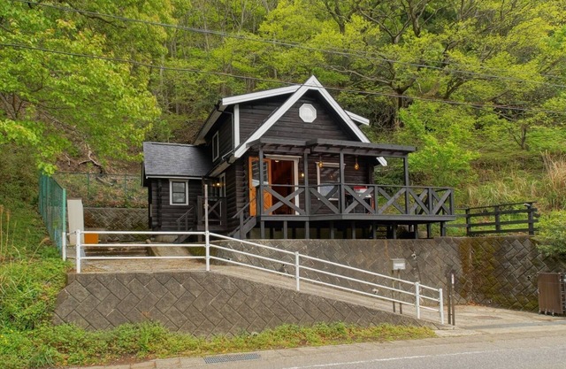 Fashionable charming log house standing /Ito Shizuoka