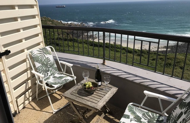 First floor balcony flat with stunning sea views.