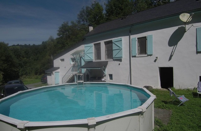 Former school with swimming pool.