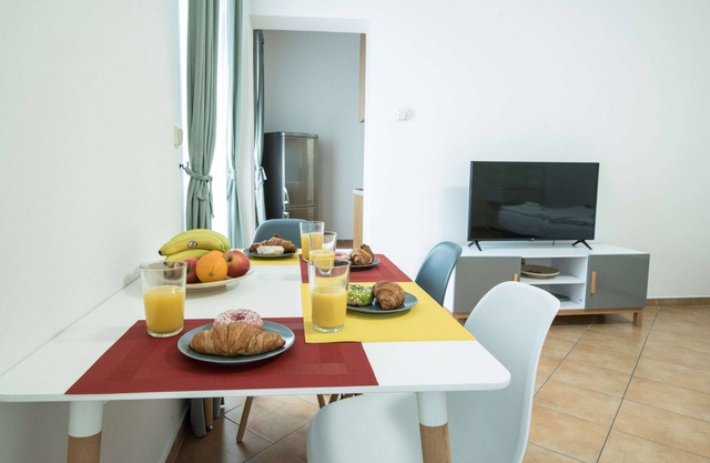 Four bed studio apartment in ground floor with bathroom and kitchen