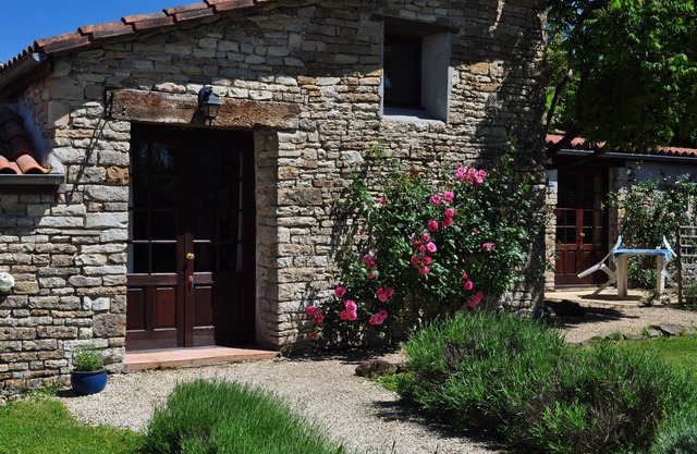Four spacious cottages with outdoor heated pool and play areas.
