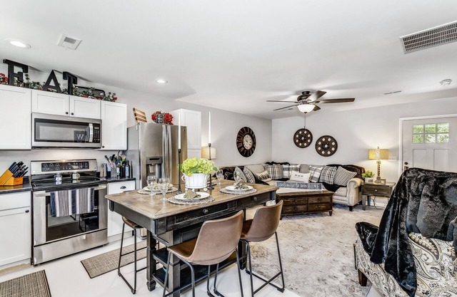 Front door parking, private covered patio with fenced in backyard