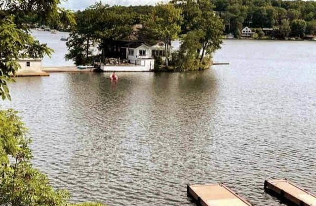 Fully accessible lake-house on its own island.