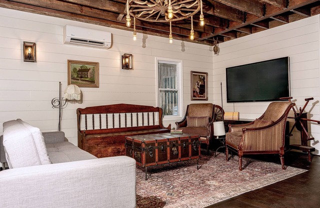Fully renovated 1800s Carriage House seamlessly blends history w/modern luxury.