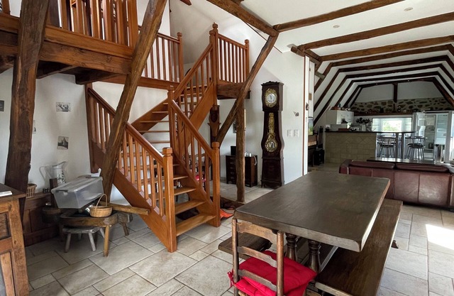 Fully restored stone and slate barn in a typical village