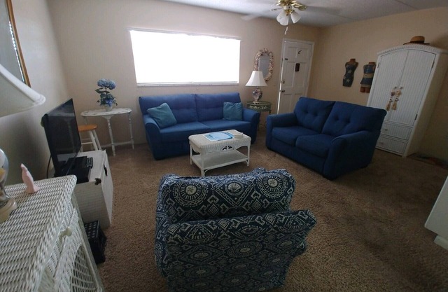 Furnished One Bedroom Condo. Water View, Heated Pool,remodeled marble bathroom.
