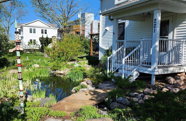 Garden setting within walking distance of River, Local Shops, and Restaurants!