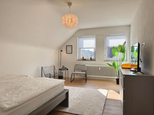 Gemütliches Dach-Apartment in der Stadt - ADAM -