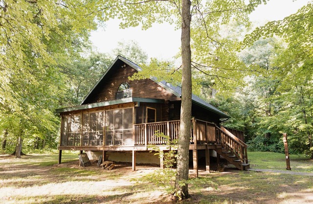 Genuine Log Cabin with large yard in a small quaint town across from Fish Lake