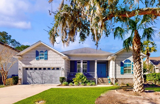 Golf course-view home near beaches with deck, porch, grill, streaming, W/D, & AC