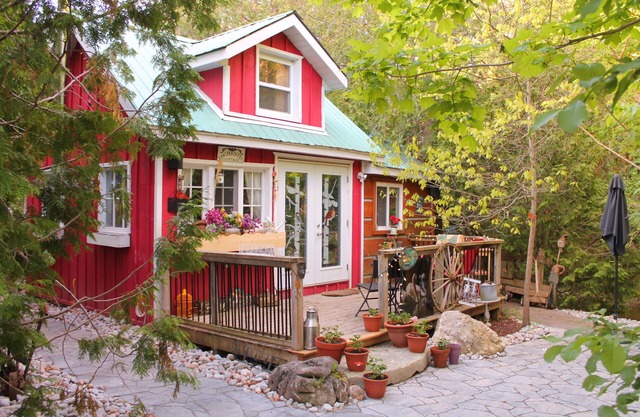 Gorgeous cozy cottage besides a bustling stream, surrounded by gorgeous greenery