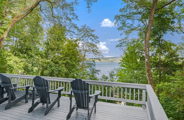 Gorgeous lakeview retreat with wraparound porch, wood stove, & WiFi - dogs OK