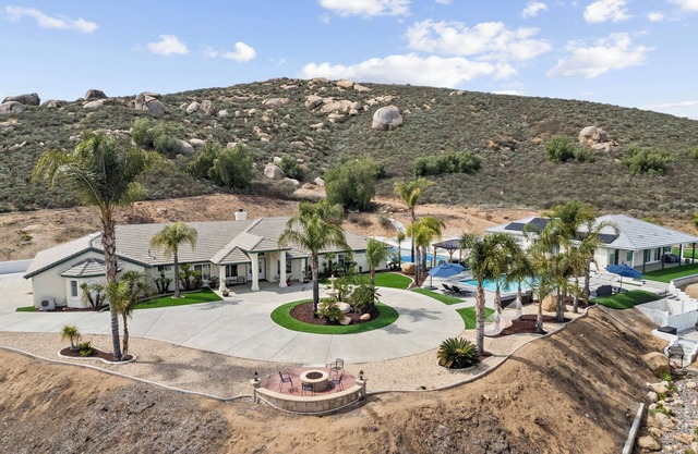 GRANDVIEW PICKLEBALL OASIS. A private 6 bedroom pool home with panoramic views.