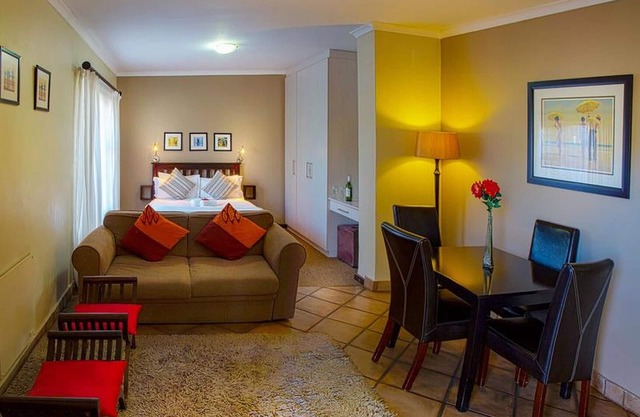 Guest room with double bed and kitchen, in Port Elizabeth ideal business travel