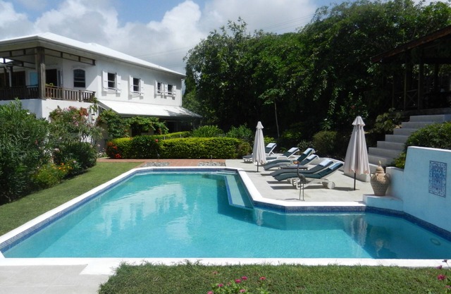 Half Moon Villa :- A beautiful villa with a large pool & garden, ocean views.