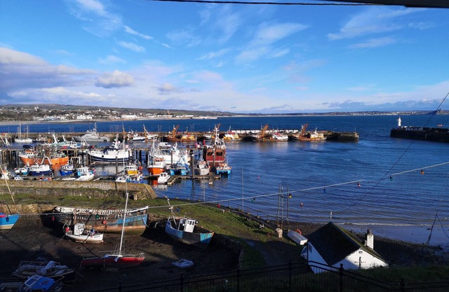 Harbour side, convenient, pet friendly, end terrace home, with parking space.