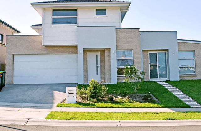 High-Ranking Two-Level House with 4 Br Gables