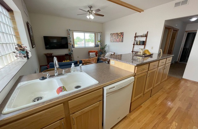 Historic 1893 Brewhouse Solarium Loft – Sun‑Drenched Mid‑Century Modern Retreat