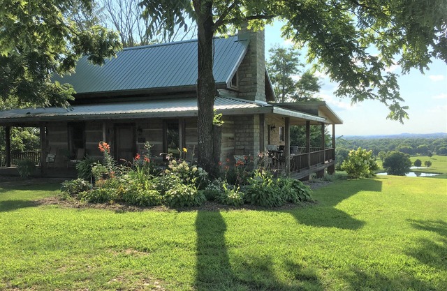 Historic Log Cabin on 200 acre farm, pasture and forest with panoramic views!
