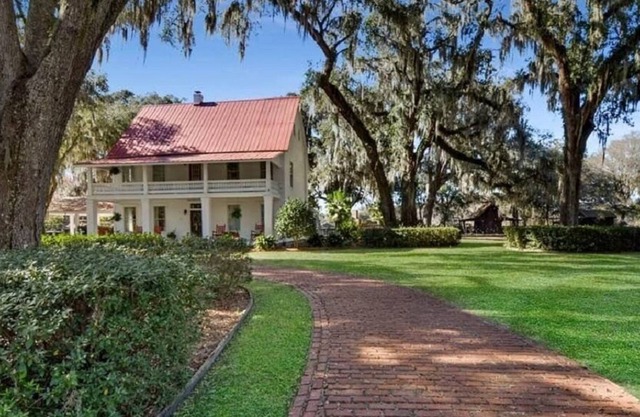 Historic Manor Nestled Among the Live Oaks