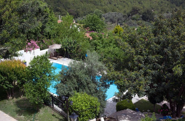 Historic stone villa in large garden with shared pool, perfect for families
