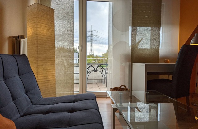 Holiday Apartment 'Haus Abendsonne Dachgeschoss Klein' with Shared Garden, Balcony and Wi-Fi