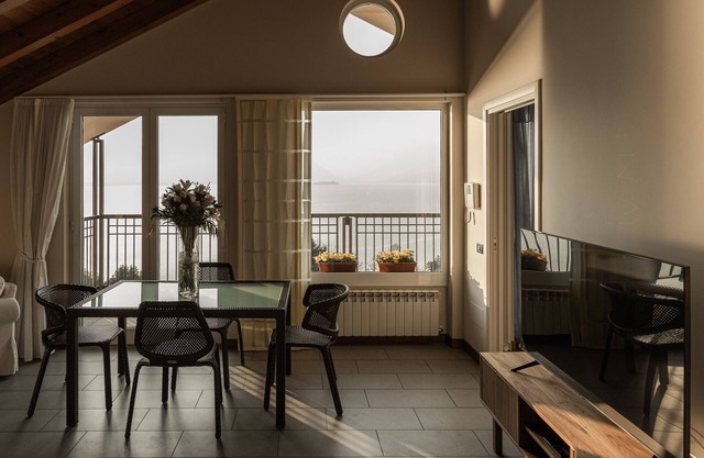 Holiday Home 'Attico Borromea' with Lake View, Shared Pool and Wi-Fi