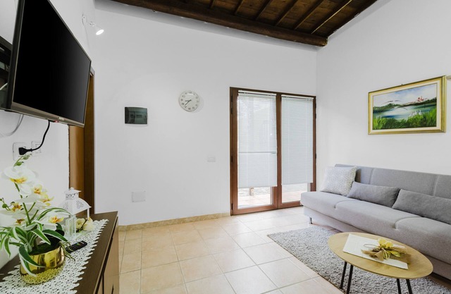 Holiday Home 'Il Corbezzolo Apartment' with Shared Terrace, Wi-Fi and Air Conditioning