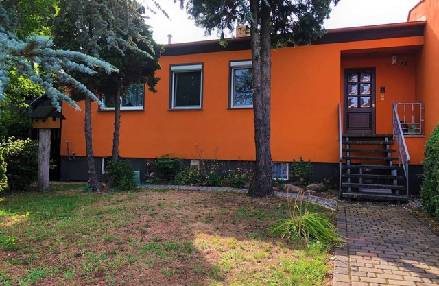 Holiday house on the meadow path