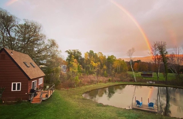 Home with a spring-fed pond and mountain view.