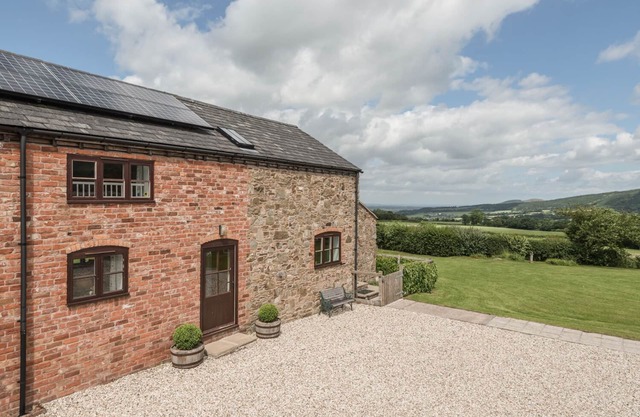HOPE HALL BARN, pet friendly, with open fire in Hope, Shropshire