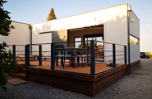 House in a farm with orange trees