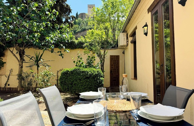 House in front of the Alhambra with a private garden and views