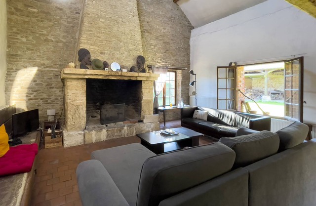 In In a charming little village in front of a XVth century chapel and a castle