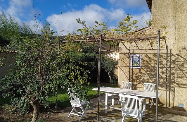 In the heart of the village charming house with garden