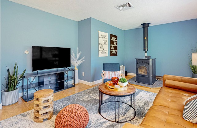 Inviting riverfront home with pool, kayaks, firepit, & W/D