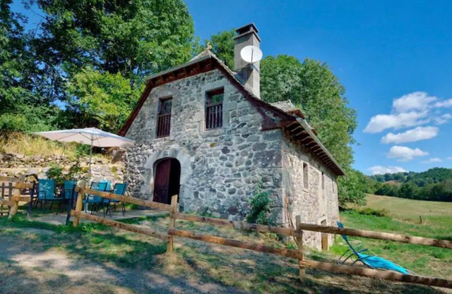 Isolated mill on river bank