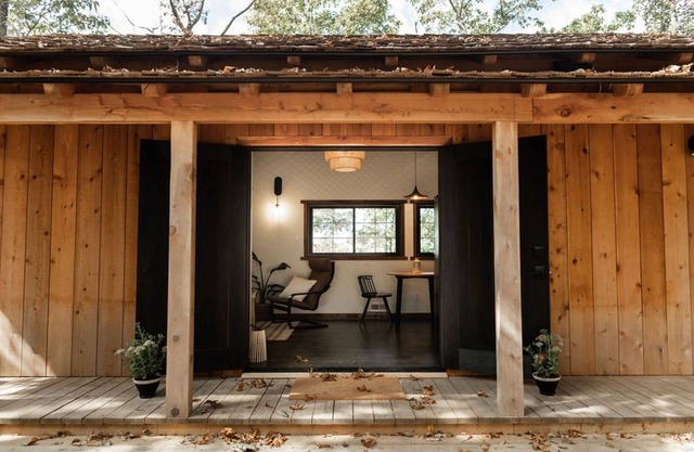 Japanese timberframe tiny house perched on side of Lookout Mountain