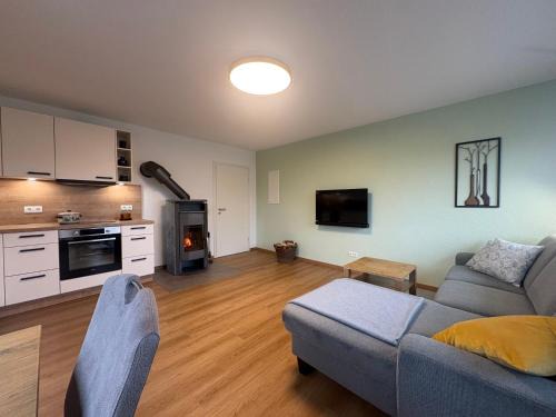 Kamin-Apartment Bodanum mit eigener Terrasse - naturnahe Ortsrandlage - VDSL - 10 min zum Nürburgring