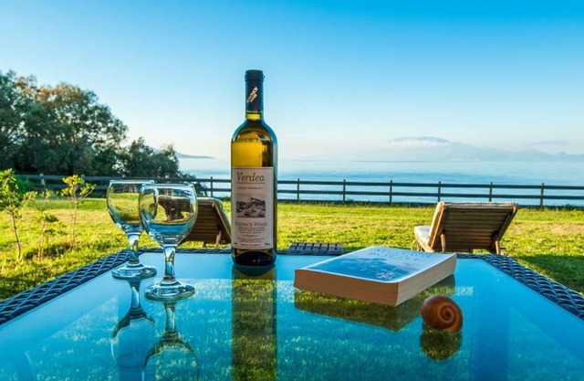 Kavos Psarou stone and wooden built sea front sea view traditional/lux villa