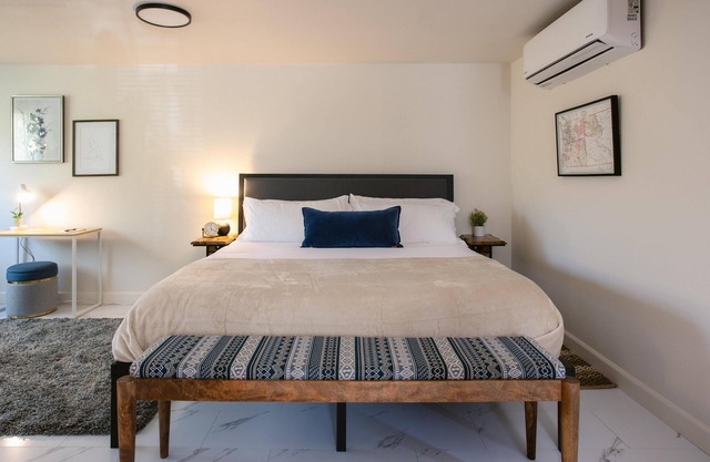 King Suite just off of I-5 directly on the Rogue River. Coffee shop across the street!