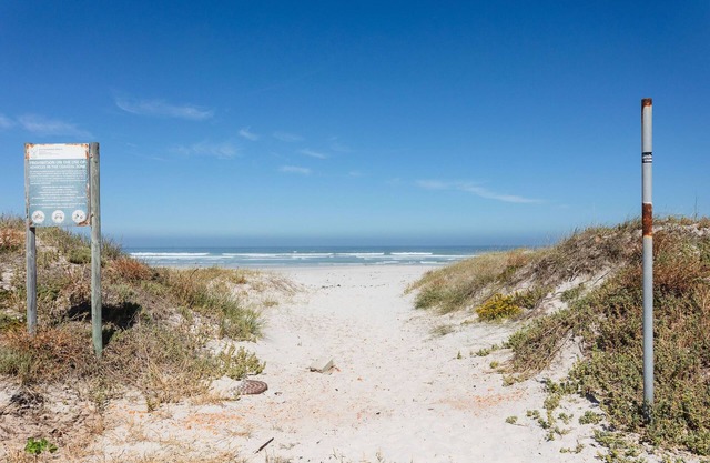 Kite boarding and wind surfing all year round on a blue flag beach.