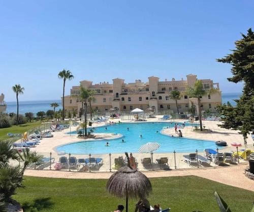 La Cala gorgeous 2 bedroom apartment with stunning gardens, pools and sea views
