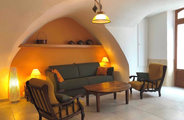 "la maison de Marie" 17th century village house stone arches courtyard + terrace